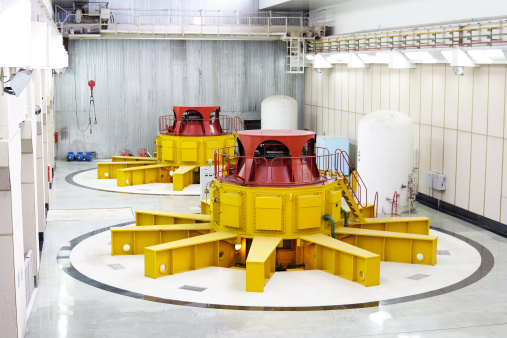 Huge water turbine generators. Hydroelectric powerplant. Interior