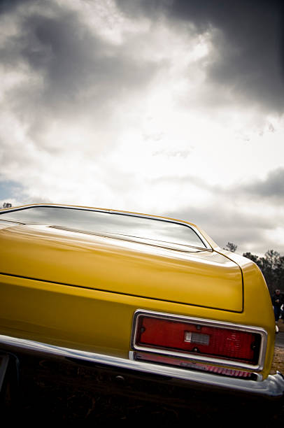istock Rear of Yellow 1969 Chevy Nova 153785028