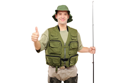 A view of a happy fisherman with thumb up isolated on white background