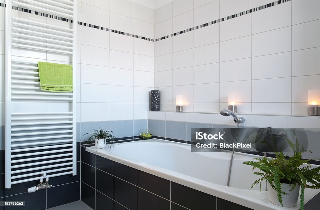 Modern Bathroom Detail of a modern bathroom with burning candles Radiator - Heater Stock Photo