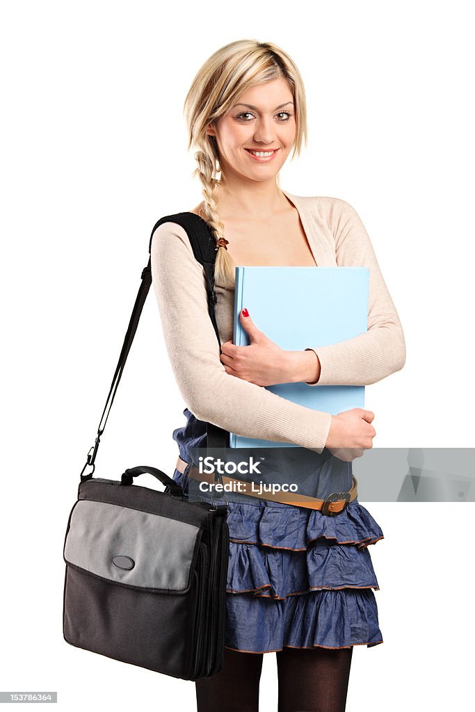 Studente sorridente con una borsa sulla sua spalla - Foto stock royalty-free di Abbigliamento casual