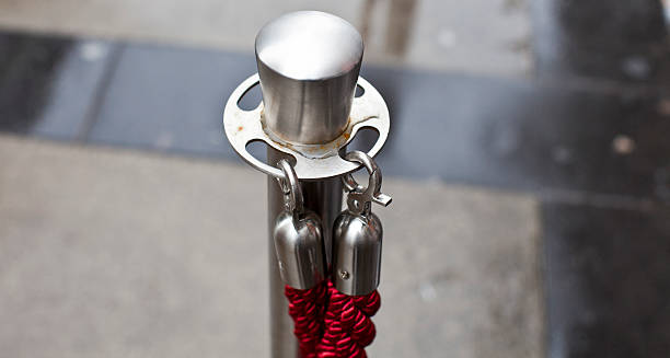 istock Metal pole with thick red rope 153787340