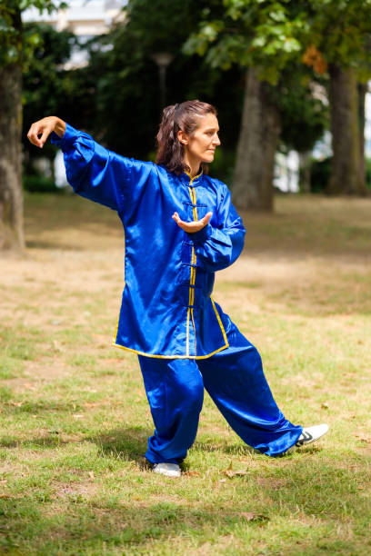 istock Middle-aged woman practicing Tai Chi 1537902564