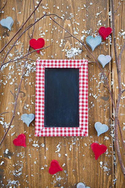 istock Wooden branches with heart-shaped ornaments 153791599
