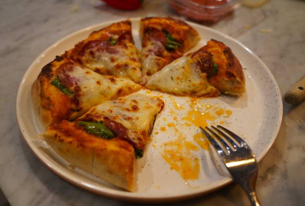 istock Family Making Pizza 1537923294