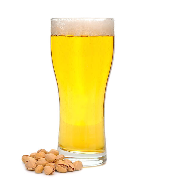 bier und pistazien - beer nuts food isolated white stock-fotos und bilder