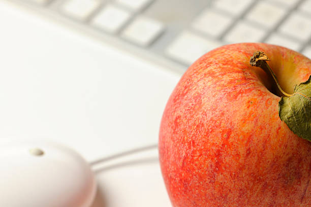 istock Healthy Organic Apple with Computer Mouse and Keyboard 153795989