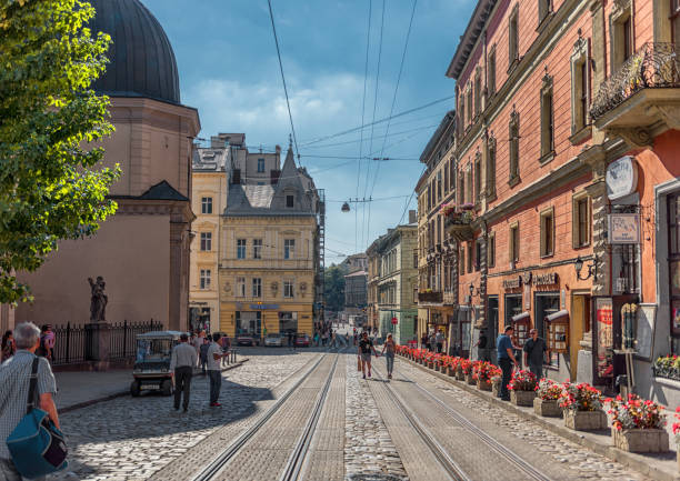 Lviv, Ukraine - September 08, 2016: Lviv City With Local Architecture and People. Empty Tram Way. Ukraine