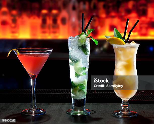 Three Cocktails On The Bar Stock Photo - Download Image Now - Cocktail, Alcohol - Drink, Back Lit