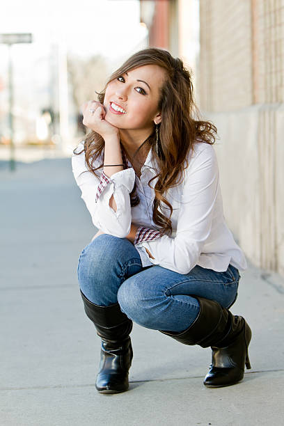 istock Young Native American Woman Crouching 153802252