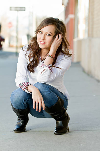 istock Young Native American Woman Crouching 153802270