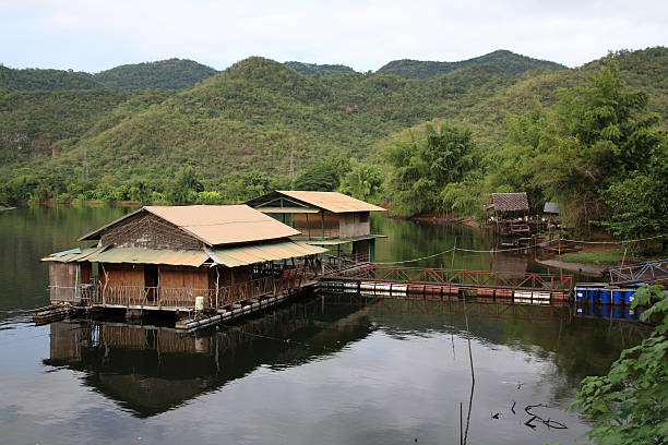 istock Floating raft restaurant and hotel on the valley river 153805858