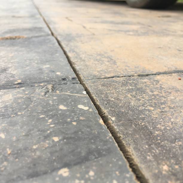 istock Close up of cement floor texture background, selective focus, vintage tone 1538063392