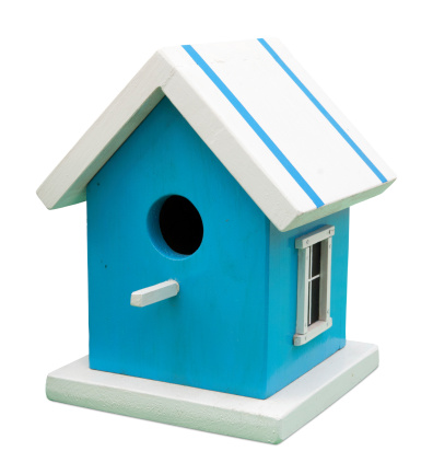 Birdhouse isolated on white. Clipping path included. May be use as real estate symbol