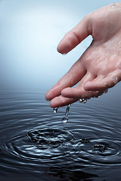 istock woman hand in water 153807527