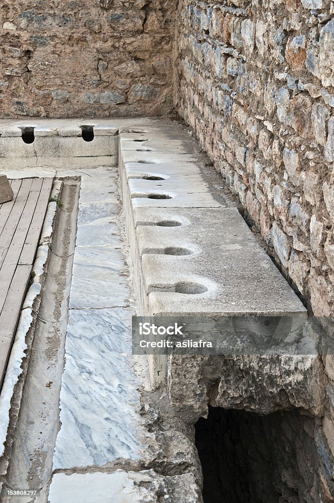 Ancient toilets of Ephesus.The latrine. The Latirne. Roman Stock Photo