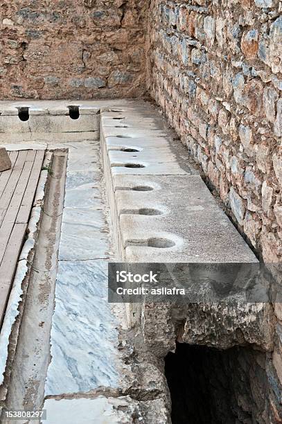Ancient Toilets Of Ephesusthe Latrine Stock Photo - Download Image Now - Roman, Aegean Sea, Ancient