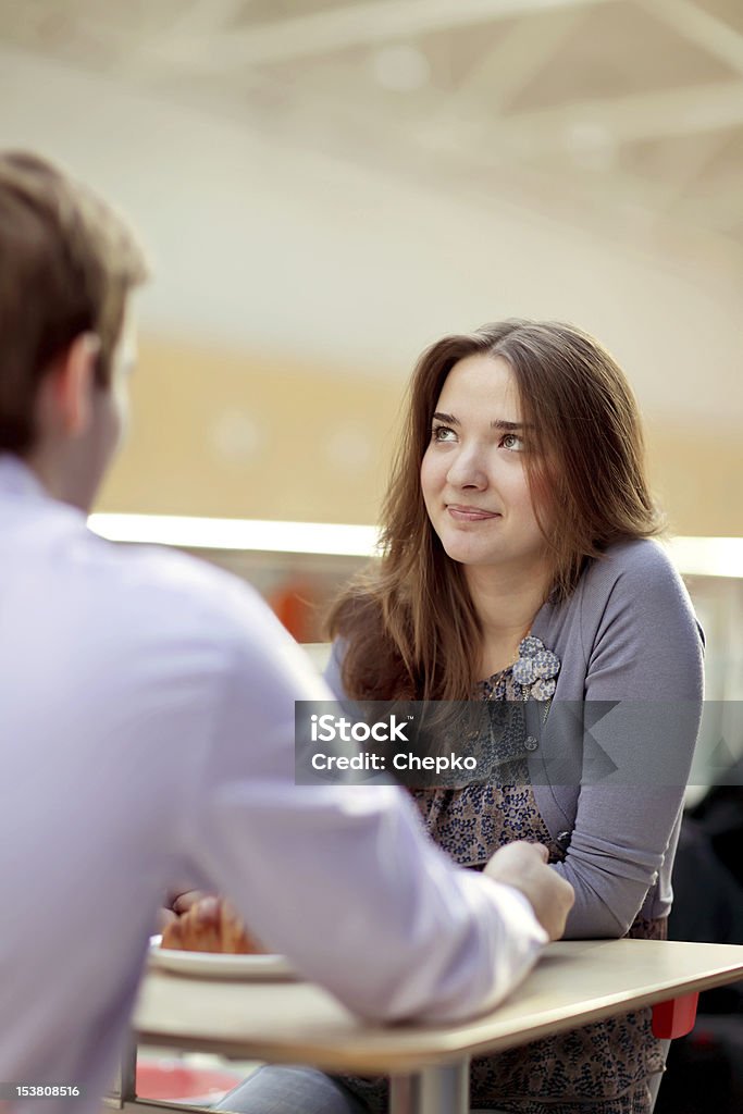 young couple in cafe Adult Stock Photo