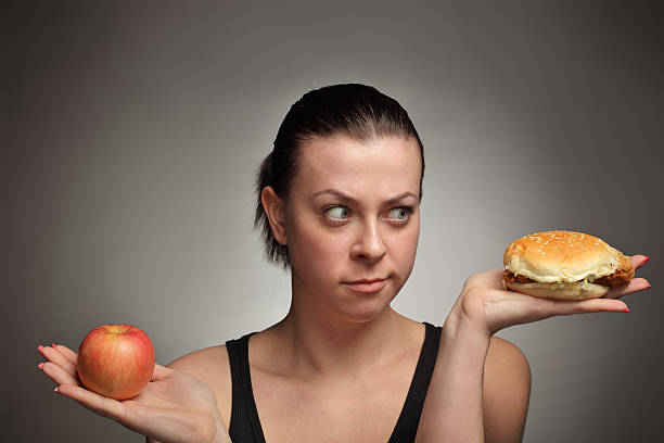concept de régime - food measuring hamburger dieting photos et images de collection