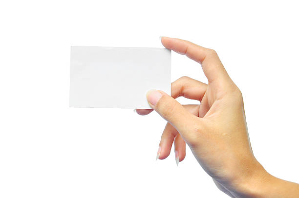 istock empty business card in a woman hand 153812588