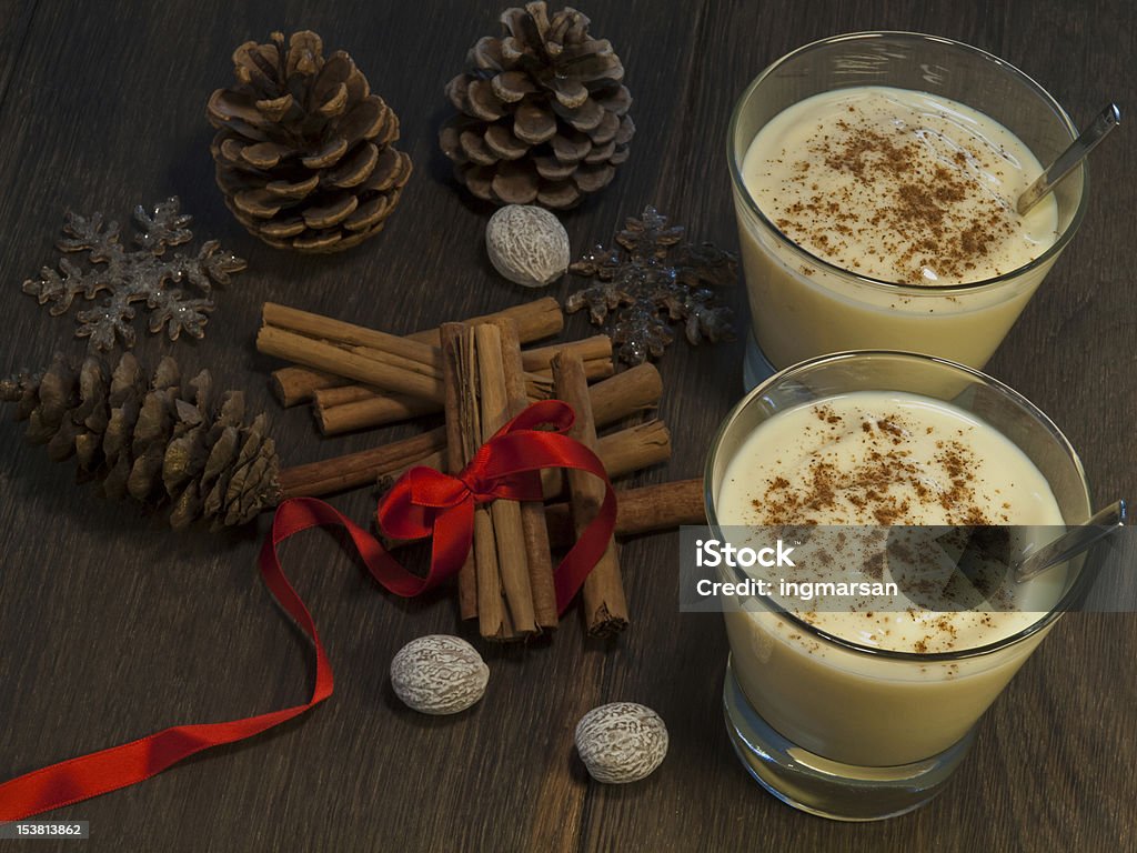Traditional Eggnog Traditional eggnog for two in winter setting, with nutmeg and cinnemon Christmas Stock Photo
