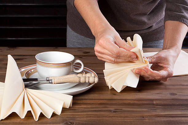 3,000+ Napkin Folding Stock Photos, Pictures & Royalty-Free Images - iStock