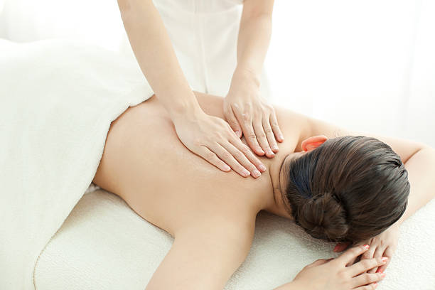 istock The beautician who massages a back 153815316
