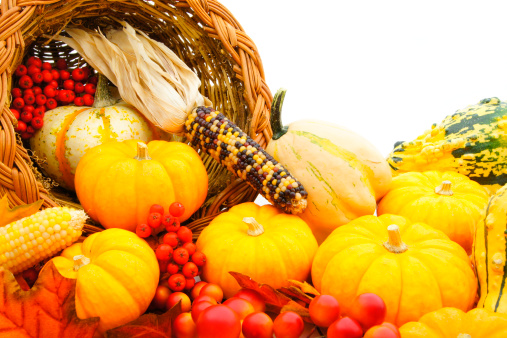 Close up of a harvest or Thanksgiving cornucopia of autumn vegetables