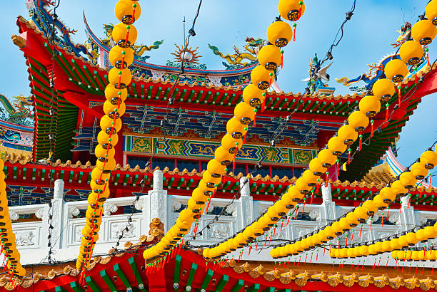 istock Yellow Lanterns Hanging at Temple Roof 153815862