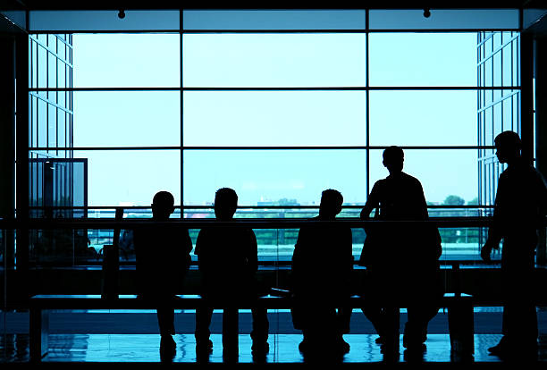istock People silhouette whit window in the background 153816481