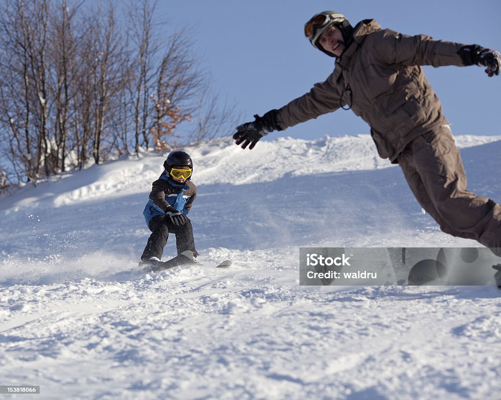 男性スノーボーダー、あらゆるスキーヤー - ゲレンデのロイヤリティフリーストックフォト
