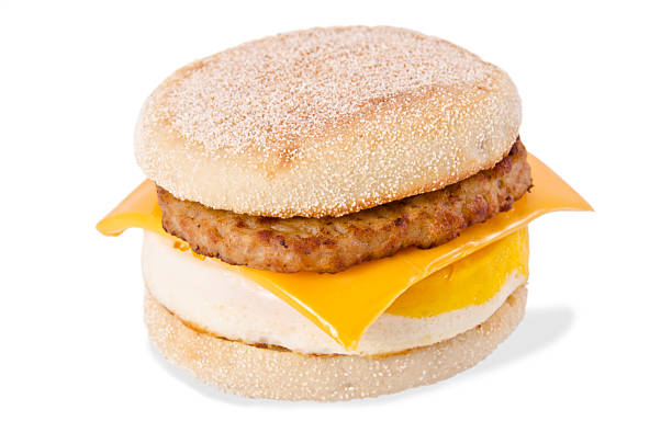 English Muffin Breakfast Sandwich Sausage, Egg and Cheese Breakfast Sandwich on a Toasted English Muffin breakfast sandwhich stock pictures, royalty-free photos & images