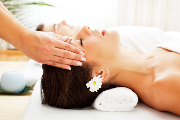 istock Couple Having Head Massage At Spa Center 153822266