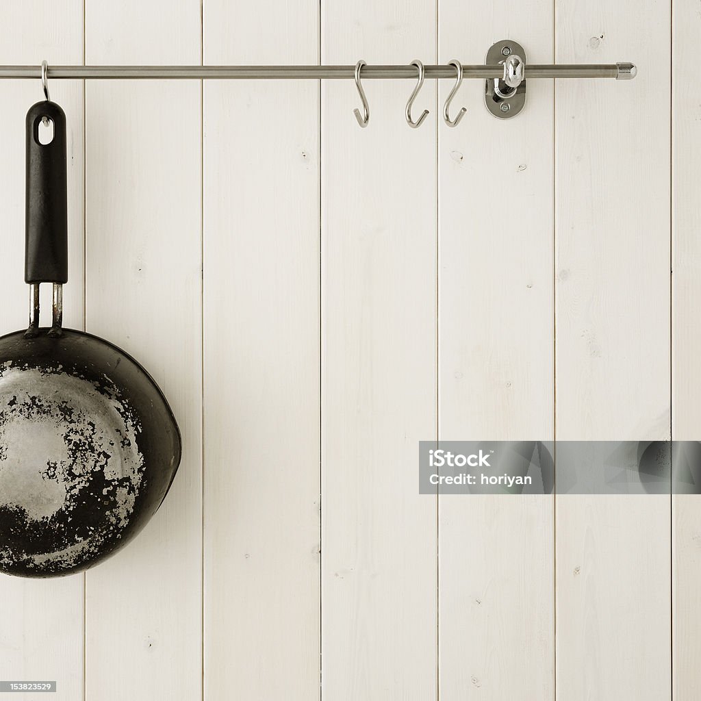 Kitchen wall Pan hanging on kitchen wall Commercial Kitchen Stock Photo