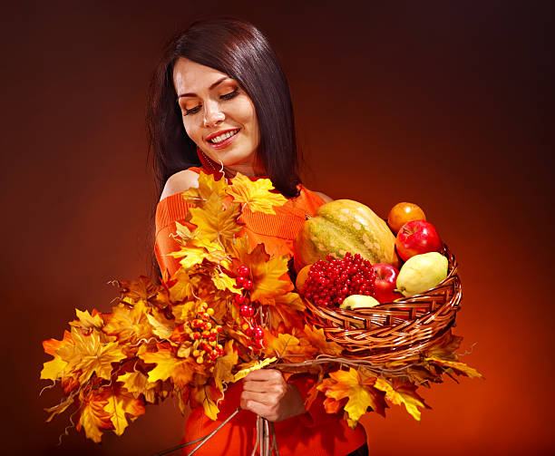 istock Woman holding autumn basket. 153823584