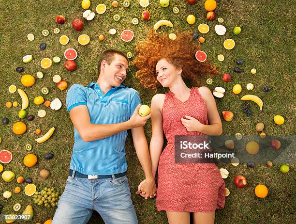 Couple With Fruit Stock Photo - Download Image Now - Adult, Cheerful, Citrus Fruit