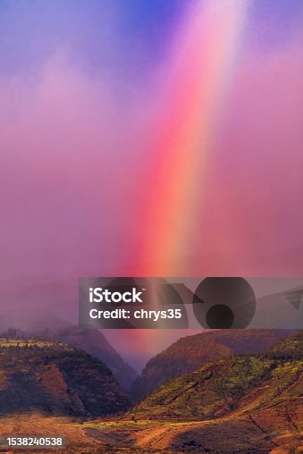 istock Beautiful evening rainbow lying across a maui valley. 1538240538