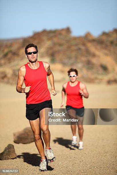 Runners Running Stock Photo - Download Image Now - 20-29 Years, Active Lifestyle, Activity