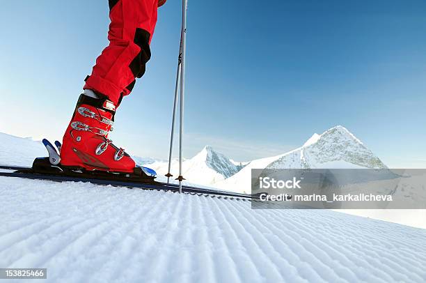 Skier On An Untouched Ski Track Stock Photo - Download Image Now - Ski Boot, Skiing, Ski