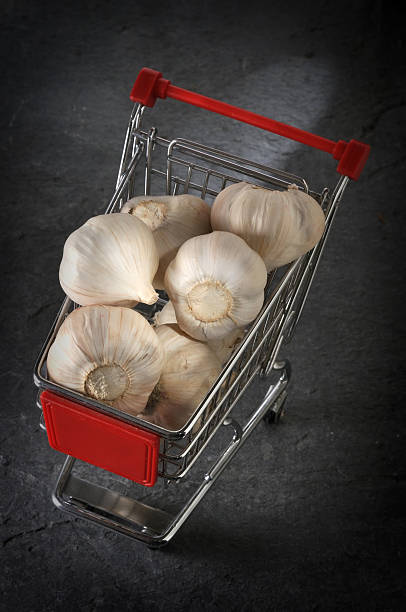 Bouquet made of vegetables. original unusual edible present. Close up. useful gift for a proper lifestyle. autumn bouquet of fresh potatoes, garlic, mushrooms concept of accumulate vitamins for winter