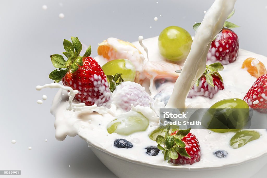 Fresh fruits and milk splash Fresh fruits and milk splash. Blueberry Stock Photo