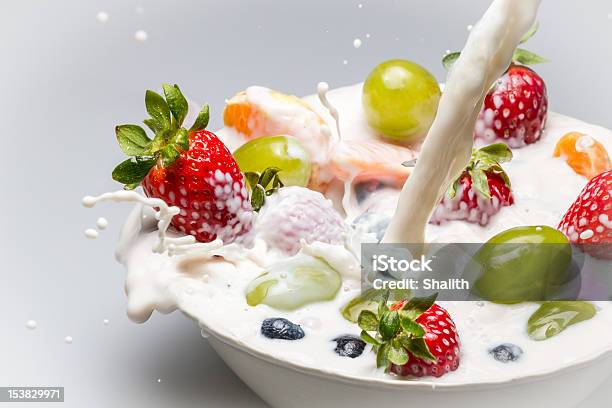 Fresh Fruits And Milk Splash Stock Photo - Download Image Now - Blueberry, Bowl, Breakfast