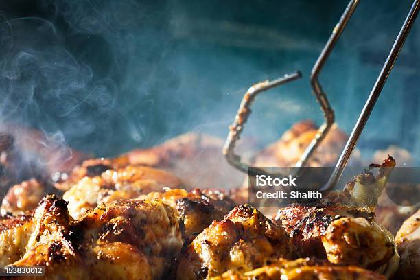 Barbecue Chicken With Cherbs On Grill Stock Photo - Download Image Now - Barbecue Chicken, Chicken Meat, Chicken - Bird