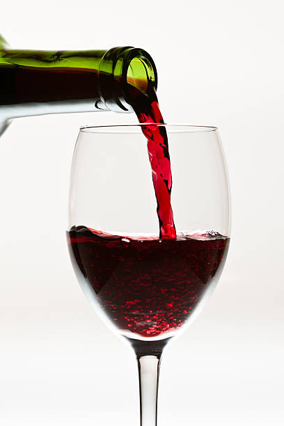 istock Red wine in the glass isolated 153830057