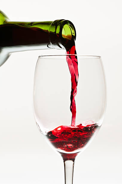 istock Red wine pouring down to the glass 153830140