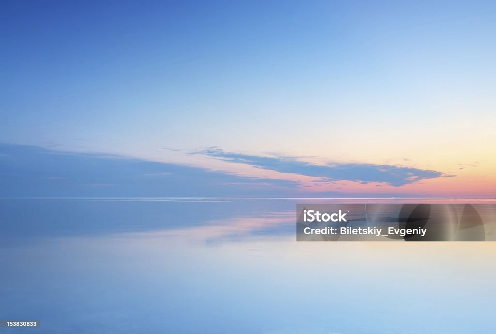 Calm seascape Calm seascape during bright sundown. Bay of Water Stock Photo