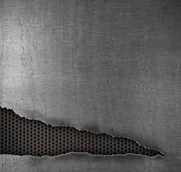 istock grunge metal background with ripped hole 153830878