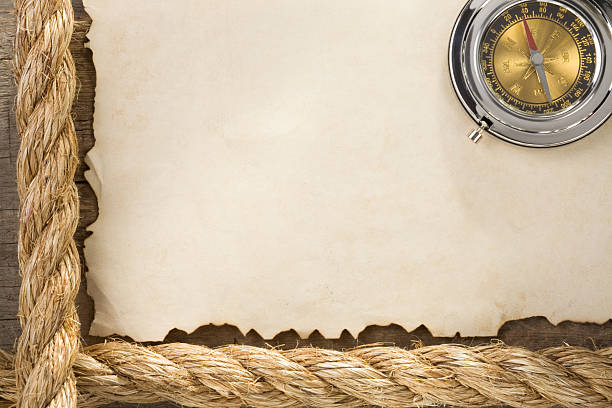 istock parchment old paper background and ship ropes 153830921