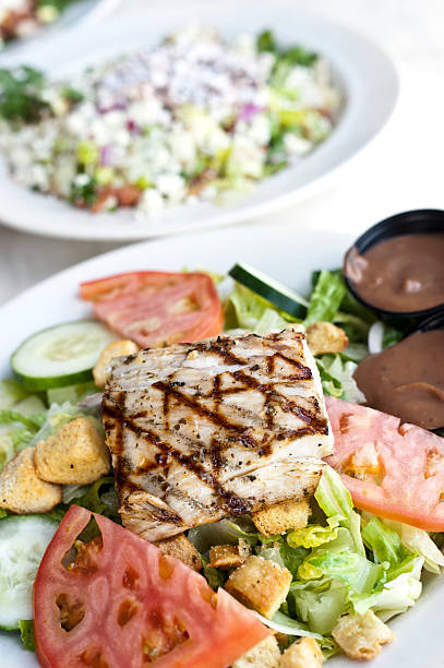 istock Grilled filled of fish with salad 153831059