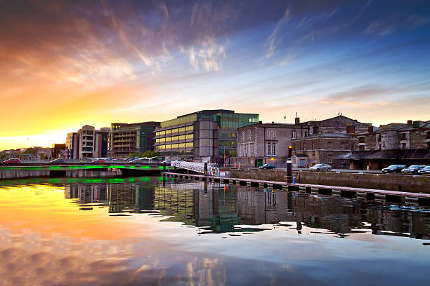 Sunset in Cork city, Ireland Amazing sunset at the river of Cork city in Ireland county cork stock pictures, royalty-free photos & images